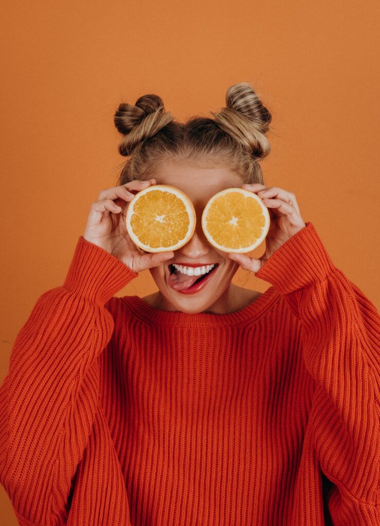 girl with oranges